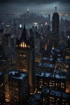 an aerial view of new york city at night with the empire building in the foreground