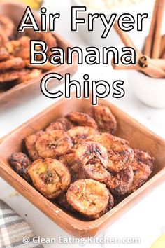 an air fryer banana chips recipe in a wooden bowl with cinnamon sticks on the side