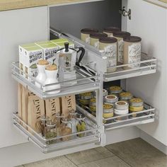 an open cabinet in a kitchen filled with spices and condiments on the shelves