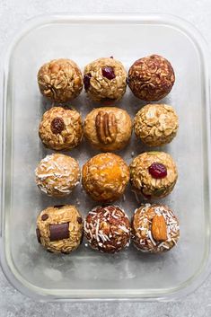 a glass container filled with different types of cookies