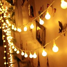 there are many lights strung on the wall