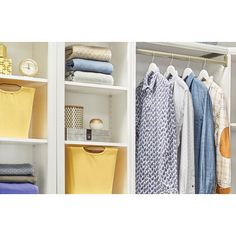 an organized closet with clothes and other items