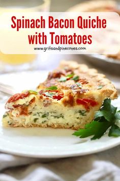 spinach bacon quiche with tomatoes on a white plate next to a glass of orange juice