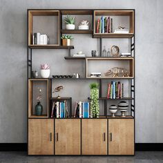 a bookshelf filled with lots of books on top of wooden shelves next to a wall