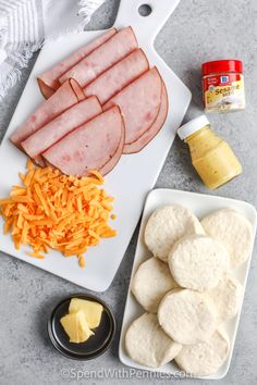 the ingredients to make an appetizer include cheese, ham, and crackers