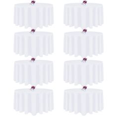 six white tablecloths with red flowers on them