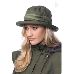 Model: 980 CANTERBURY HAT_FERN 100% waterproof Cloche style Suedette trim Perfect for the cold, rainy weather CANTERBURY HAT BY TARGET DRY Cantebury is a high quality rainhat. Designed to match our Outback and Outrider raincoats, the Canterbury is the perfect accompaniment to a winter wander in the rain. Waterproof Hat, Country Fashion Women, Rain Hat, Womens Fashion Casual Spring, Fern Green, Latest Colour, Rainy Weather, Womens Fashion Edgy, The Lighthouse