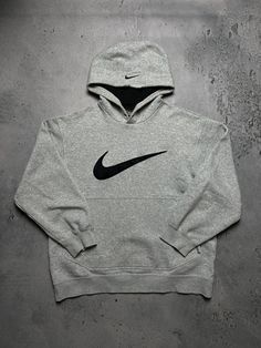 Nike × Nike ACG × Vintage 🔥 Nike boxy fit vintage hoodie center swoosh spellout y2k Size Men's / US S / EU 44-46 / 1 Color Grey Nike central logo swoosh The material is pleasant to the body. In a good condition. Fast sending! Condition : 8.5/10 Chest - 59 cm Lenght - 64 cm Shoulders - 52 cm Sleeve length - 54 cm - ALL ITEMS ARE HEAT TREATED AND WASHED BEFORE SHIPPING - FOLLOW MY STORE - SEE MY OTHER ITEMS Grey Nike Hoodie, Central Logo, Nike Sweats, Grey Nikes, Nike Acg, Vintage Hoodies, Vintage Nike, Nike Logo, Mens Sweatshirts