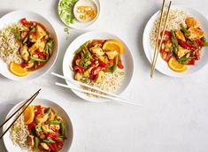 three plates of food with chopsticks on the side and rice in each plate