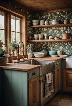 a kitchen filled with lots of dishes and wooden cabinets