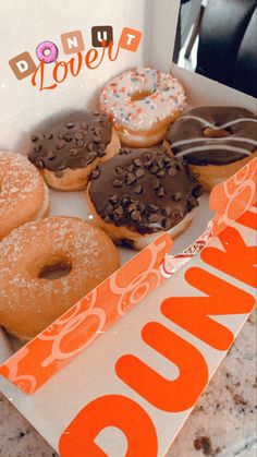 an open dunkin donuts box with six different kinds of doughnuts in it