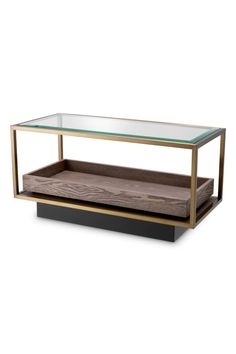 a glass and metal coffee table with two shelves