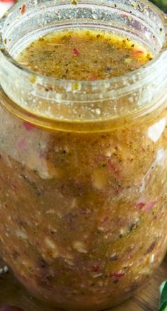 a jar filled with food sitting on top of a table