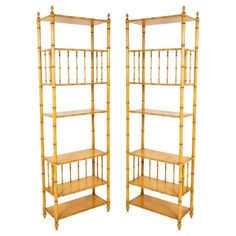 a pair of bamboo shelves on wheels with wooden shelves in the shape of bookshelves