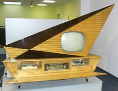 an old fashioned television set with a triangle shaped body