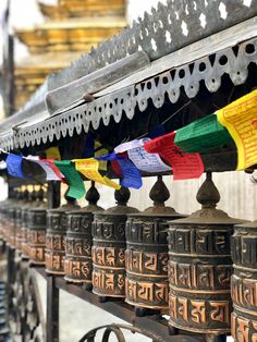 several bells with different colors hanging from them