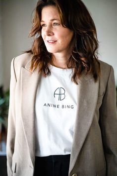 StyleDahlia wearing a spring go to outfit combo blazer + graphic tee. #styledahlia #aninebing #aritzia #over40style #styleover40 #blazeroutfits Shirt Outfits, Stylish Blazer, Warm Spring, Tshirt Outfits, Blazer Outfits, In Bloom, Shirt Outfit, Spring Fashion