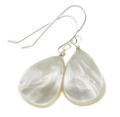 PRICES MAY VARY. Quality White Mother of Pearl; Teardrop shape Simple design casual or dressy Earrings hang 1.4 inches Mannequin photo shows relative size and how they will hang High Quality Sterling Silver French Ear wires These earrings are a great wardrobe staple and timeless in design. Please note photos show camera lighting, shadows and reflections. Earrings comes wrapped and packaged in a small colorful tie pouch. A gift box option is available with your selection of the gift wrapping opti Dressy Earrings, Ivory Earrings, Mother Of Pearl Earrings, All Gems, Earrings Large, Earrings White, Bracelets And Necklaces, Pearl Shell, Shell Earrings