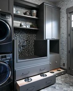 a washer and dryer in a small room