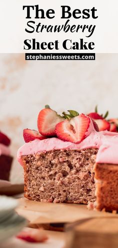 the best strawberry sheet cake with pink frosting and fresh strawberries on top is ready to be eaten