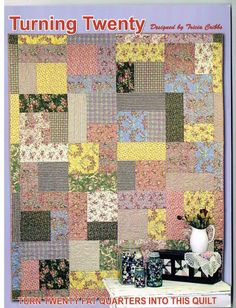 the cover of turning twenty quilts, with an image of a vase and flowers