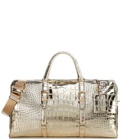 From Michael Kors&#x2C; the Bedford Travel Extra-Large Metallic Crocodile Embossed Leather Weekender Bag features:Metallic crocodile-embossed leatherGold-tone hardwareLining: polyesterLeatherTrim: nylonInterior details: back zip pocket&#x2C; back slip pocket&#x2C; 6 front slip pocketsExterior details: snap pocket&#x2C; 2 side snap pockets&#x2C; removable luggage tagZip fasteningHandle drop approx. 6"Adjustable strap appro Michael Kors Bedford, Leather Weekender Bag, Leather Weekender, Side Snap, Pale Gold, Dillard's, Weekender Bag, Embossed Leather, Emboss