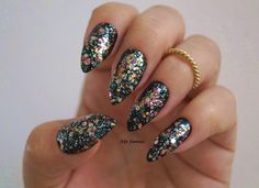 Kylie Jenner inspired nails Black glitter stiletto nails Black Glitter Nails, Nails Acrylic Almond, Casket Nails, Matte Stiletto Nails, Kylie Jenner Black, Black Nails With Glitter, Black Stiletto Nails, Glitter Stilettos, Bling Ideas