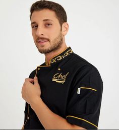 White short sleeve Gold embroidery Chef Lycra Cook Jacket of high quality Collar, sleeve pocket and back chef gold embroidery Black Gold Leaf "Chef" Embroidered Lycra Chef Jacket and with all the icons visible in the picture  It is made of first quality lycra fabric. The jacket is fastened on the front with 6 mother-of-pearl-plated free nickel snaps. The collar and cuffs of the product are embroidered with fork and knife motifs. It should sit from the waist. White short sleeveand cuffs must be f Chef Jackets Design, Cool Memes, Union Logo, Fork And Knife, Chef Uniform, Chef Coat, Uniform Shirts, Lycra Fabric, Chef Gifts