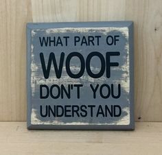 a sign that says, what part of woof don't you understand?