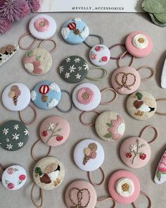 several different types of hair clips on a table