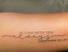 a tattoo with the words i am with you always written in cursive writing