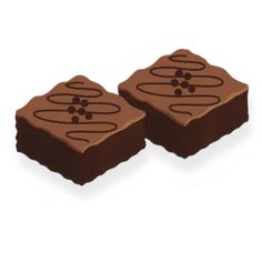 two pieces of chocolate sitting side by side on top of each other with swirl designs