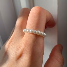 PLEASE READ: Make sure you take your ring of to wash your hand/swim etc to keep it in best possible condition  Size - ring comes in Small, Medium and large - - - -however it can be made in any UK ring size if you message me  Made - I make the earring to order  - handmade Colour - white Pearl  Customisation  - this product also comes in a bundle containing a matching pair of Pearl earrings  - if you have any requests message me  Shipping -Free Uk shipping Questions  - feel free to message me with Adjustable Trendy Crystal Ring For Wedding, Minimalist Adjustable Pearl Rings, Adjustable Sterling Silver Pearl Ring For Everyday, Minimalist Stackable Adjustable Pearl Ring, Adjustable Stackable Minimalist Pearl Ring, Elegant White Hypoallergenic Midi Rings, Adjustable Simple Pearl Ring For Promise, Adjustable White Crystal Toe Ring, Adjustable White Crystal Ring For Gifts