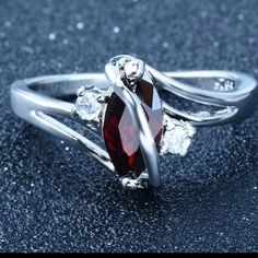 New With Box. Austrian Crystal Around Ruby Colored Gem Elegant Silver Ruby Ring For Valentine's Day, Elegant Burgundy Rings For Gift, Party Ruby Ring In Silver, Silver Ruby Ring For Party, Party Silver Ruby Ring, Silver Garnet Ring For Valentine's Day, Ss Ring, 7 Rings, Ring Color