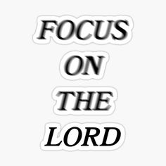 the words focus on the lord in black and white sticker with an image of a cross