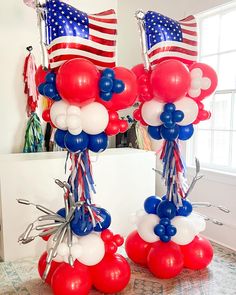 patriotic balloons in the shape of american flags