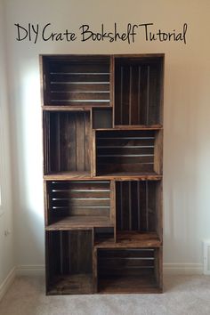 a bookcase made out of wooden crates with the words diy crate bookshelf