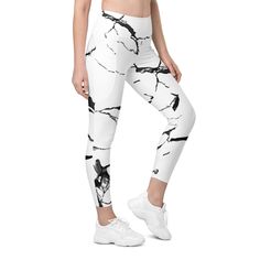 Meet your new favorite pair of pocket leggings. Featuring a classic, high-waisted cut, exceptional comfort, and two practical side pockets, these semi-compression leggings will support you during workouts and casual strolls around the city. Get yours now! * 74% polyester, 26% spandex * UPF 50+ * Soft and stretchy fabric with a mild compression feel. * Tight fit * Flattering cut * High-waisted * 1 pocket on each side * Triangle gusset * Blank product components sourced from China This product is Fitted Yoga Pants With Side Pockets For Running, White Activewear With Pockets For Training, Fitted Gym Leggings With Side Pockets, Fitted Leggings With Pockets For Running, White Running Activewear With Pockets, Functional White Activewear With Side Pockets, Fitted Leggings With Side Pockets For Training, Casual Training Leggings With Side Pockets, White Activewear With Side Pockets For Gym