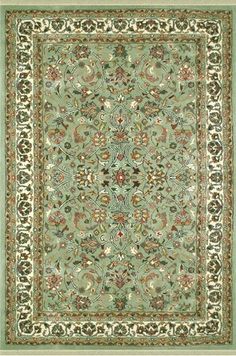 a green rug with an ornate design on the center and sides, in various colors