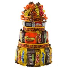 a stack of candy bars stacked on top of each other in the shape of a tower