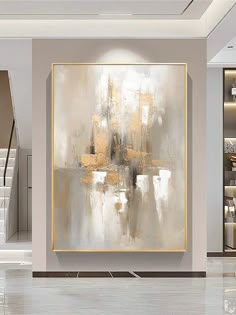 an abstract painting hangs in the middle of a room with white and gold accents on the walls