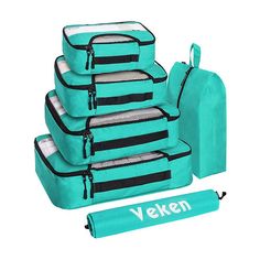 five pieces of luggage with the word veken on it and two bags next to them