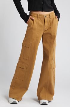 A plethora of cargo pockets lends utilitarian-inspired appeal to high-waisted pants fashioned in a wide-leg silhouette. 32" inseam; 25 1/2" leg opening; 10" front rise; 15" back rise 98% cotton, 2% spandex Machine wash, tumble dry Imported Wide Leg Cargo Jeans, Cargo Jeans, High Waisted Denim, High Waisted Pants, Fashion Pants, High Waist, Wide Leg, Nordstrom, High Waisted