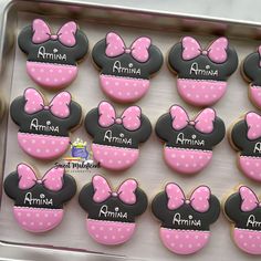 decorated cookies in the shape of minnie mouse ears