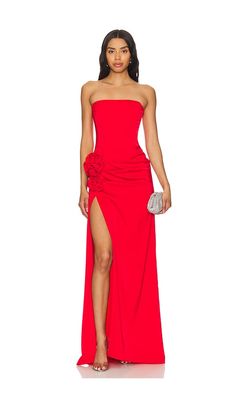 Find NBD Jake Gown on Editorialist. NBD Jake Gown in Red. - size XL (also in XXS) NBD Jake Gown in Red. - size XL (also in XXS) Self: 96% polyester 4% elastane Lining: 97% cotton 3% elastane. Made in China. Hand wash. Unlined. Hidden back zipper closure. Boned at bodice Draped fabric at waist with 3D floral accent. High slit design with satin fabric. Neckline to shortest hem measures approx 20 and to longest hem approx 53 in length. NBDR-WD3199. ACD3121 S24. For the girl who's the life of the pa Social Calendar, Designer Party Dresses, Cute Homecoming Dresses, Wedding Guest Looks, Column Gown, Strapless Gown, Satin Gown