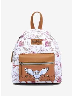 a harry potter backpack with an owl on the front and side pocket, in white