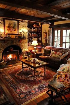 a living room filled with furniture and a fire place