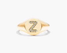 14K Yellow Gold Diamond Z Initial Signet Ring. This timeless ring will dazzle all who see it. Perfect for any age and occasion, this ring makes the perfect individualized gift! Luxury Initial Ring With Vs Clarity, Classic Gold Initial Ring With Brilliant Cut, Gift Initial Ring With Diamond Accents, Open Ring Signet With Brilliant Cut For Gift, Brilliant Cut Open Signet Ring As Gift, Brilliant Cut Open Signet Ring Gift, Signet Ring With Brilliant Cut As A Gift, Luxury Initial Ring With Brilliant Cut For Gift, Luxury Brilliant Cut Initial Ring As Gift