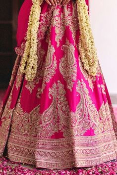 Fuchsia pink kalidar lehenga crafted in pure silk with all over Gul embroidery using zardozi, embossed motifs, intricate kasab and pearl highlights. Paired with a matching embroidered leaf neck cap sleeves cutwork border blouse and an embroidered pure silk dupatta. - Aza Fashions Pink Tilla Dupatta, Pink Gown For Traditional Ceremonies During Festive Season, Pink Gown For Traditional Ceremonies And Festive Occasions, Pink Gown For Festive Traditional Ceremonies, Festive Pink Gown For Traditional Ceremonies, Festive Pink Tilla Dupatta, Pink Bollywood Gown For Traditional Ceremonies, Pink Zari Work Dress For Traditional Ceremonies, Pink Lehenga With Zari Work For Traditional Ceremonies