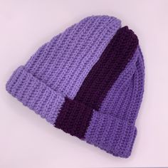 Shades of lavender and plum in vertical stripes circle this cozy, comfy beanie.  Made from 100% acrylic, worsted weight yarn.  Handmade crochet. *Design is NOT slouchy, made to fit on the head without extra room. Approx 8.5" from top of hat to bottom of folded brim. ONE SIZE - should fit child L or adult XS/S/M Hand Knitted Purple Crochet Hat One Size Fits Most, Purple Hand Knitted Crochet Hat One Size, Hand Knitted One Size Purple Crochet Hat, Purple Yarn Crochet Hat, Purple Yarn Crochet Hat For Winter, Purple Warm Hats One Size Fits Most, Hand Knitted Purple Crochet Hat One Size, Purple Crochet Hat One Size Fits All, Purple Hand Knitted Crochet Hat